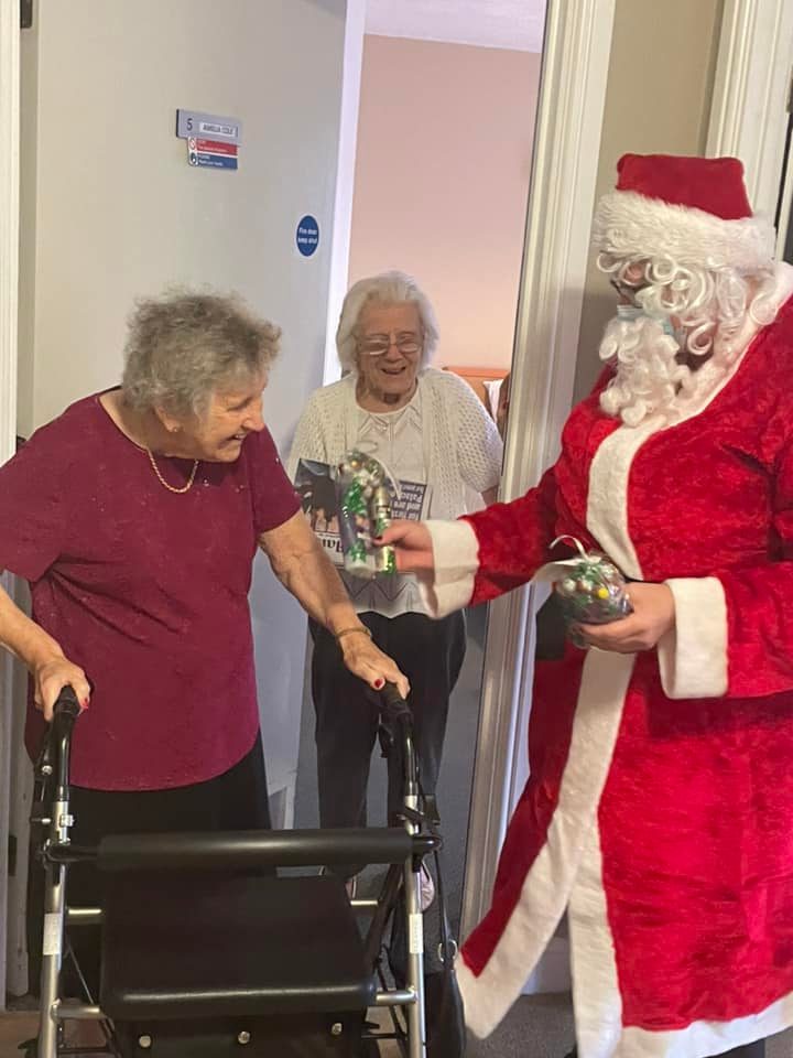 giving presents to residents
