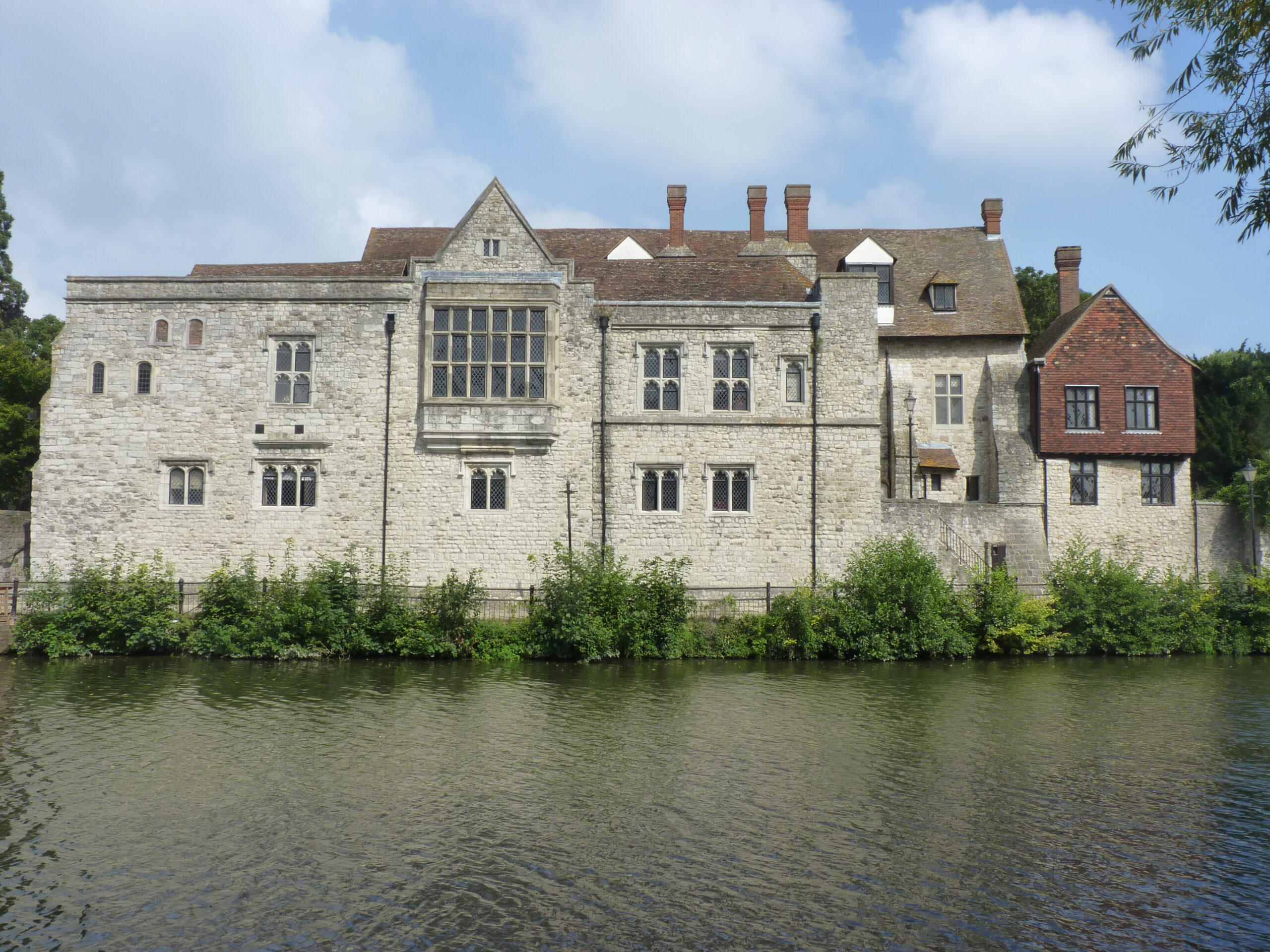 The Archbishops Palace in Maidstone building with water in front.