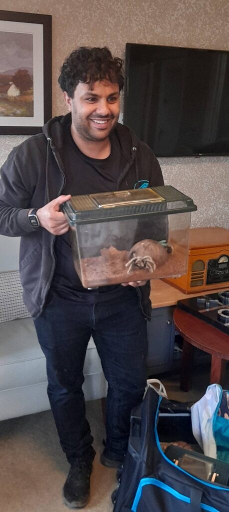 man holding tarantula