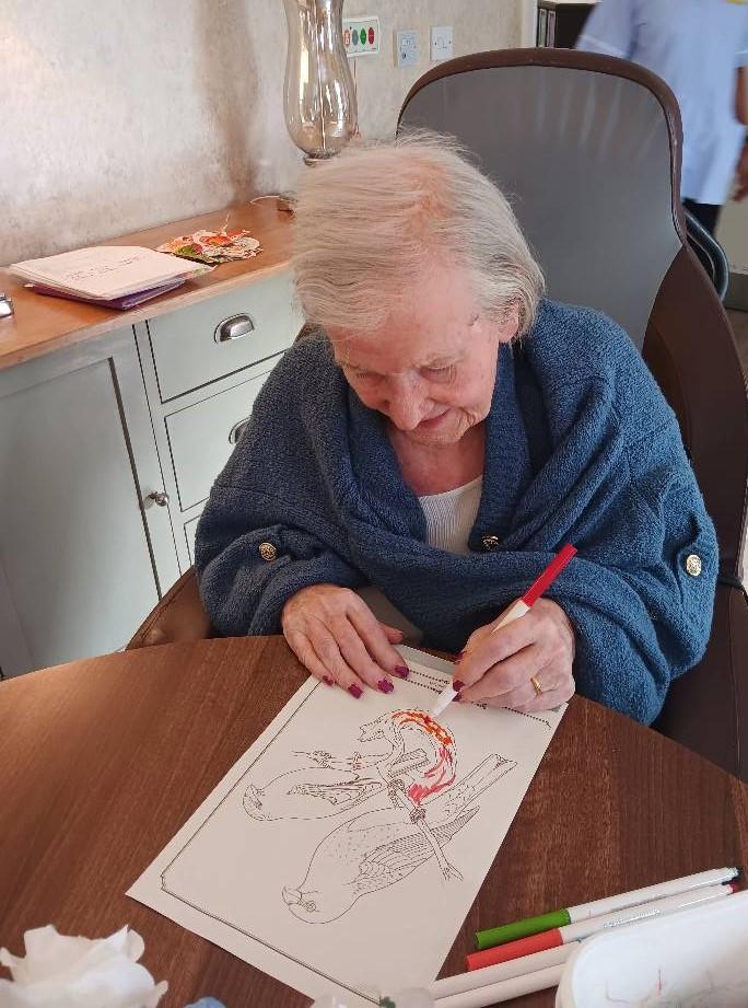 resident doing colouring